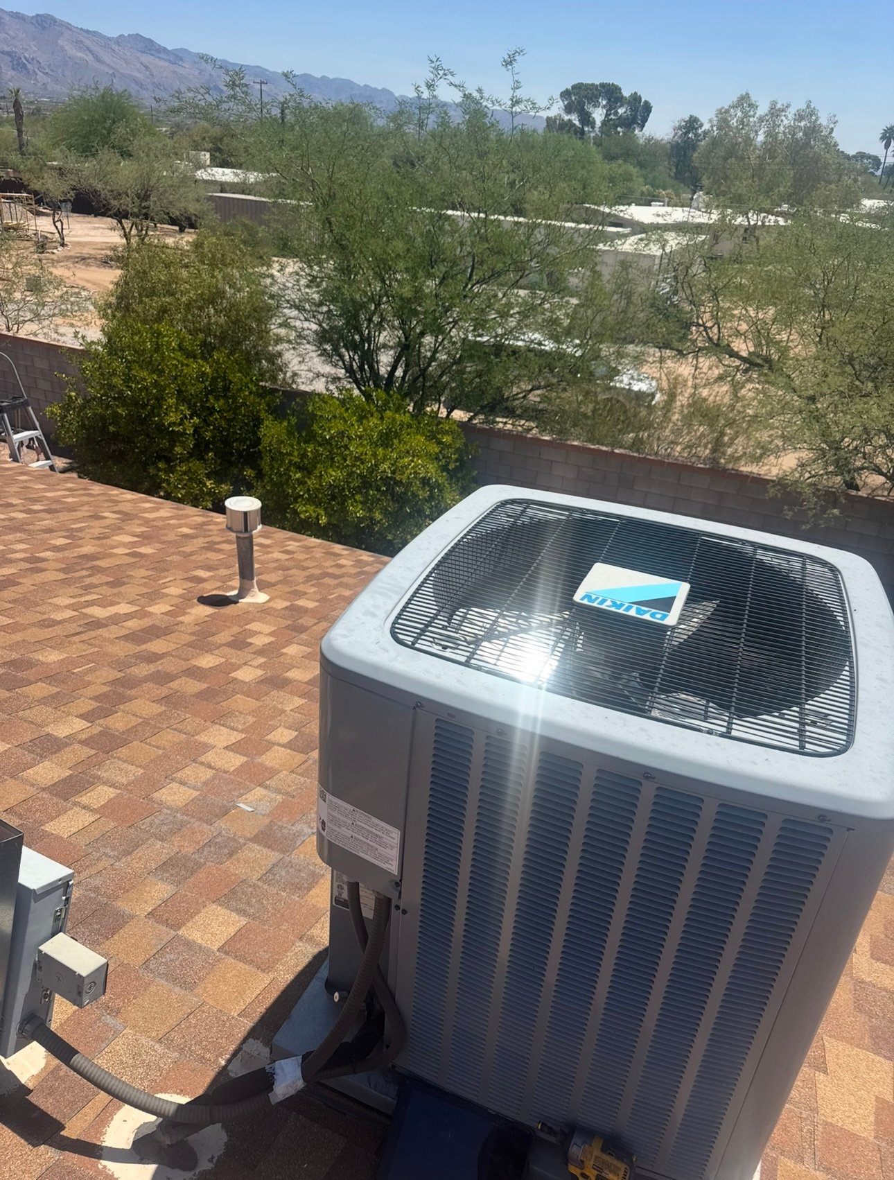 New AC condenser installed in a residential system in Tucson