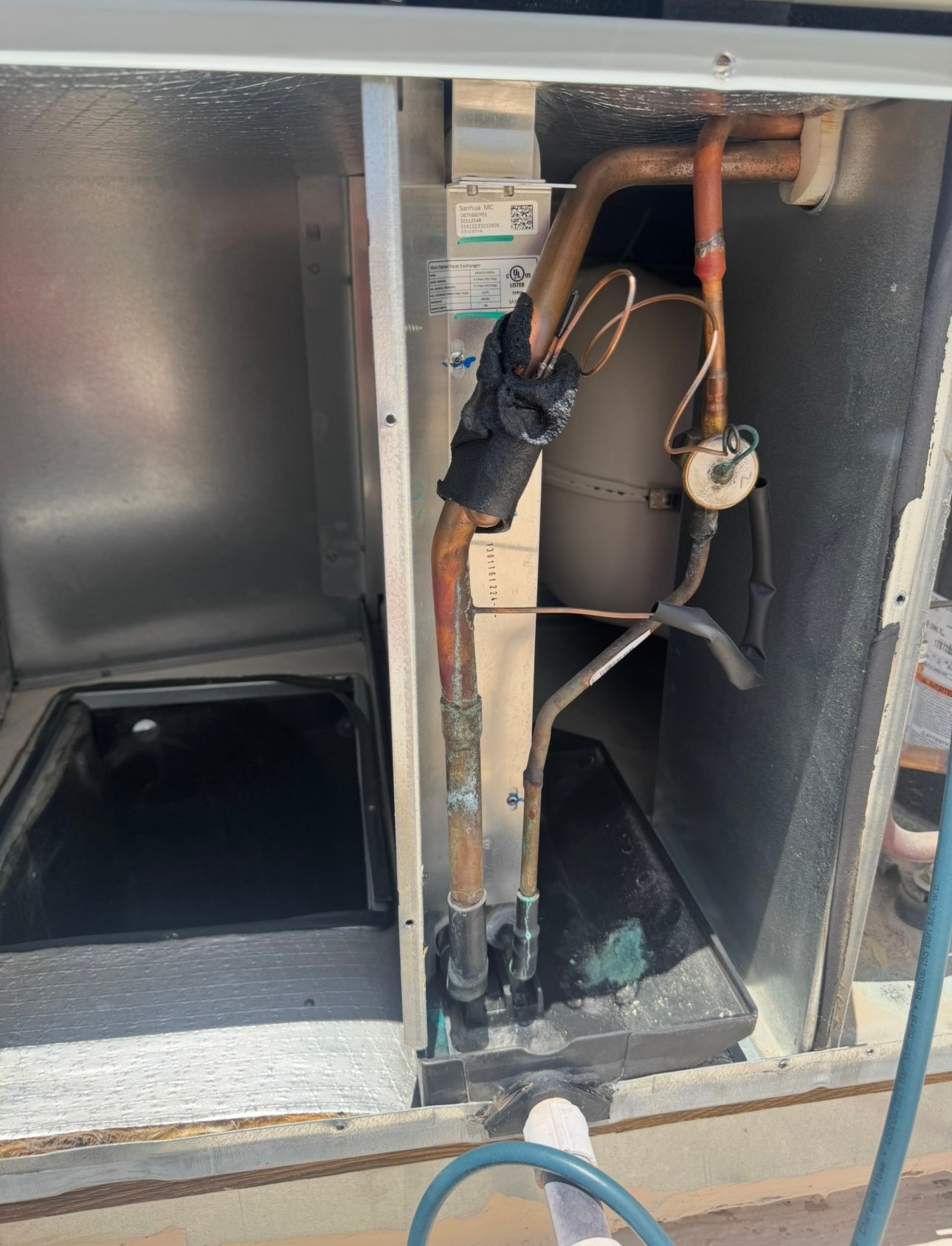 Leaking evaporator coil in a residential HVAC package unit in Sierra Vista
