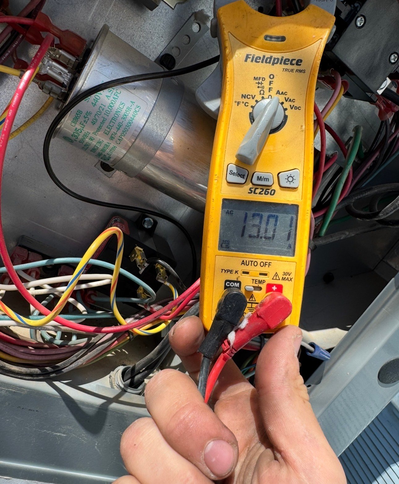 Emergency HVAC technician servicing system in Tucson and Sierra Vista