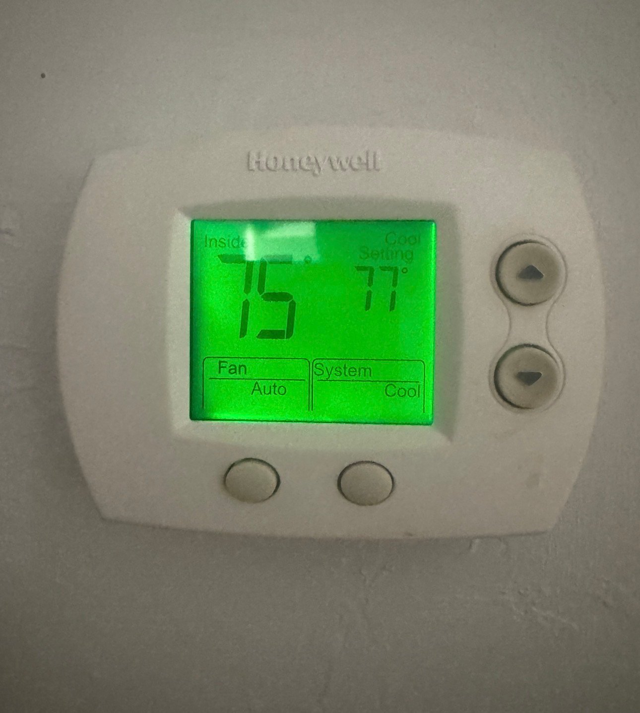 Thermostat set to 75 degrees during AC tune-up service