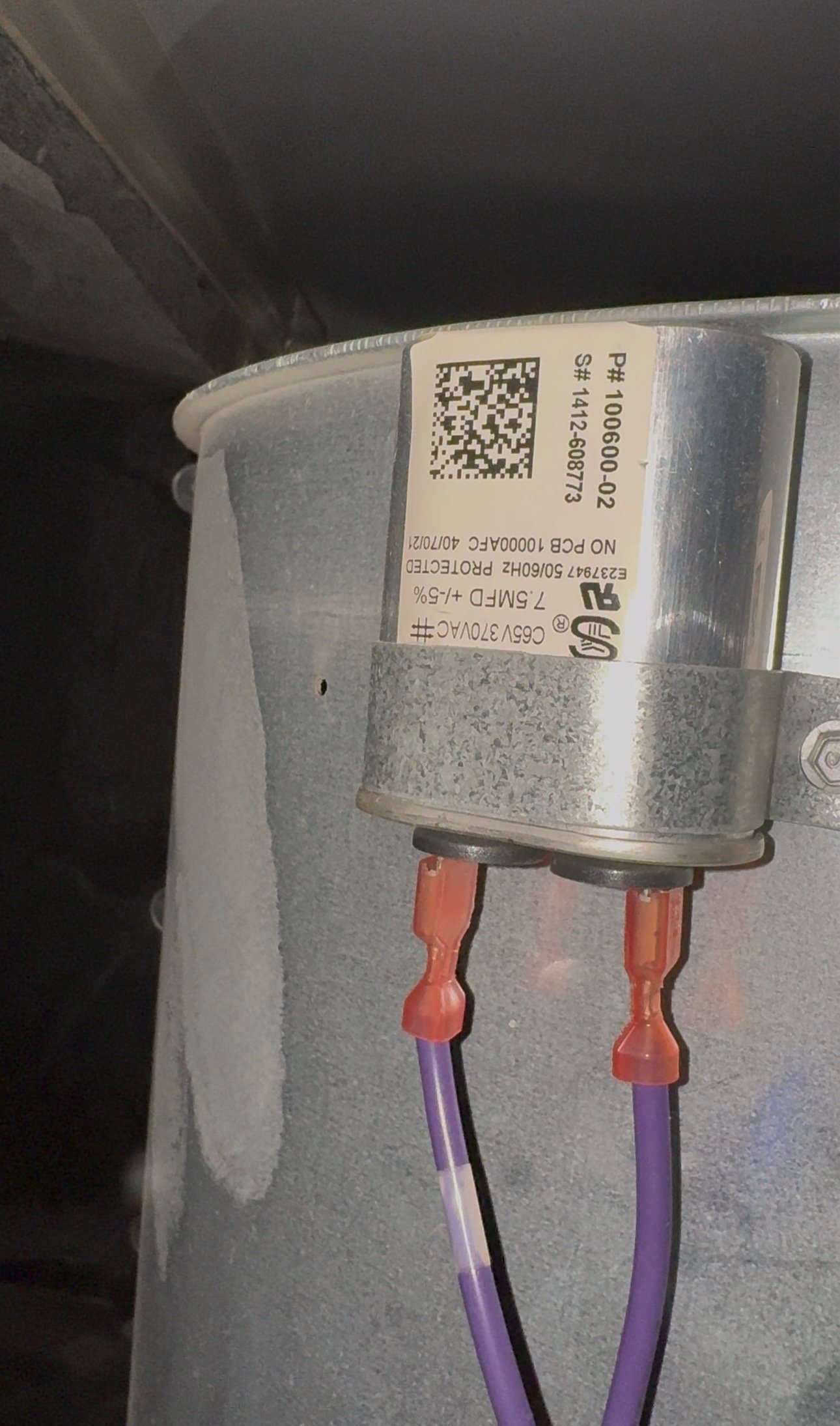 Indoor fan capacitor for an AC system being tested in Catalina, AZ