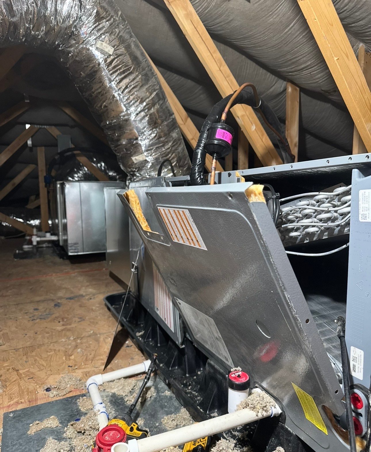 Two heat pump air handlers installed in an attic in Marana, AZ