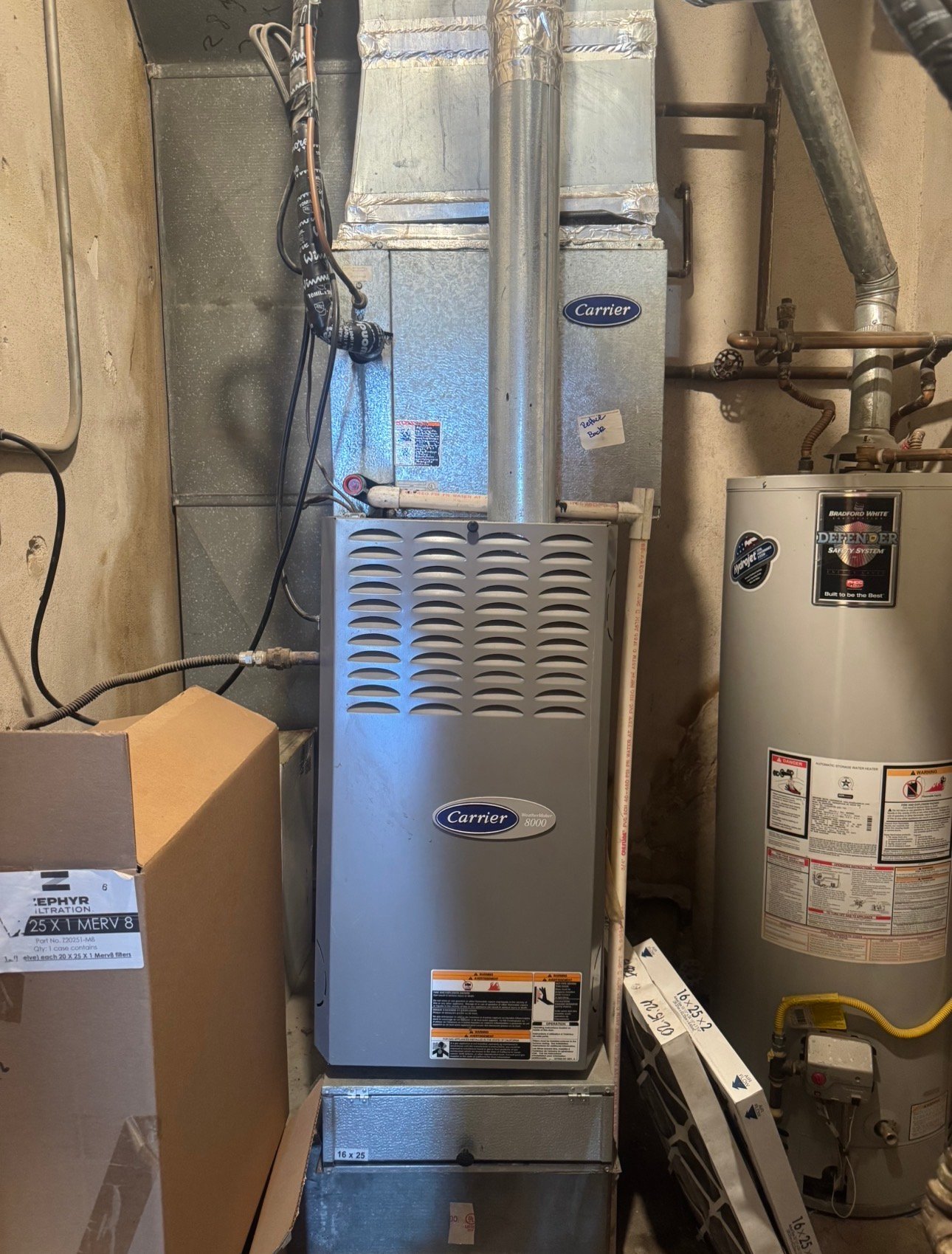 Older Carrier furnace system in a Casas Adobes, AZ home