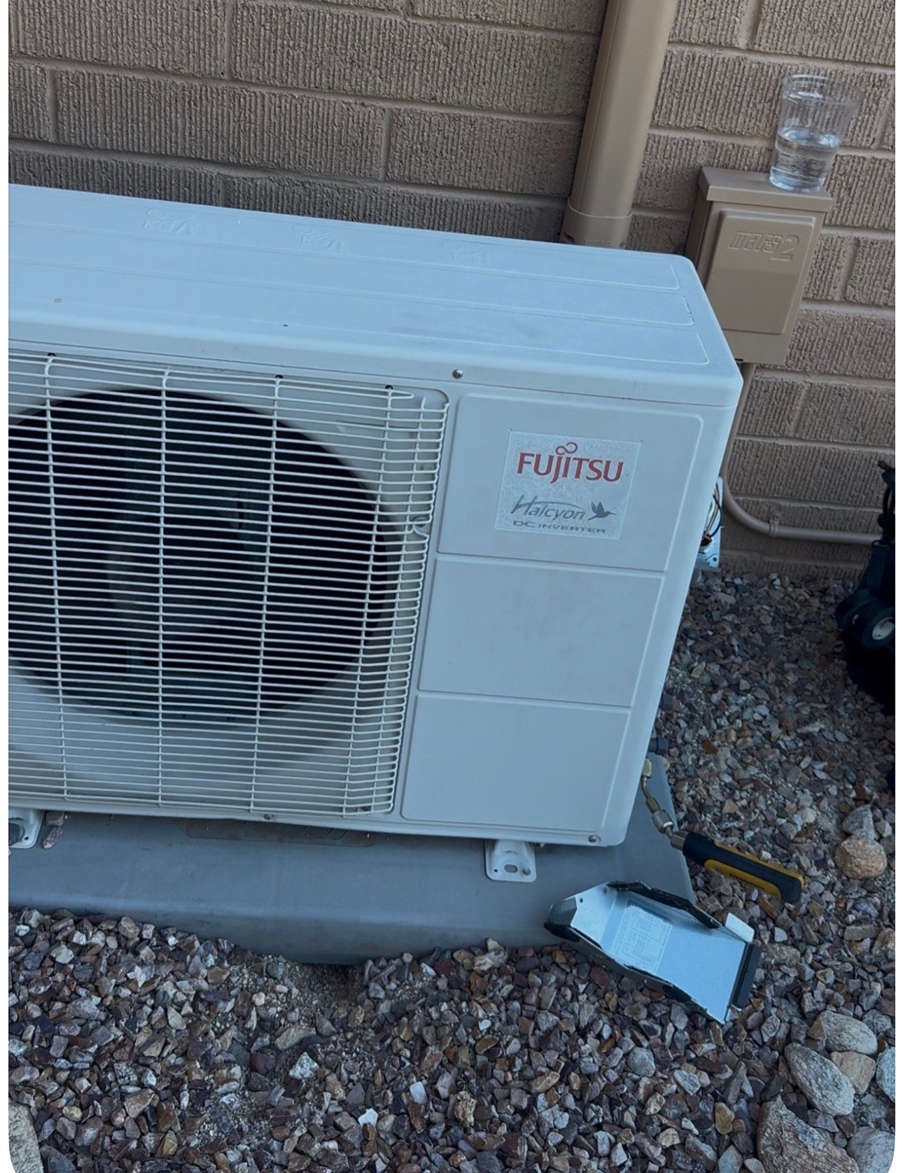 Mini-split condenser unit being serviced in Marana, AZ