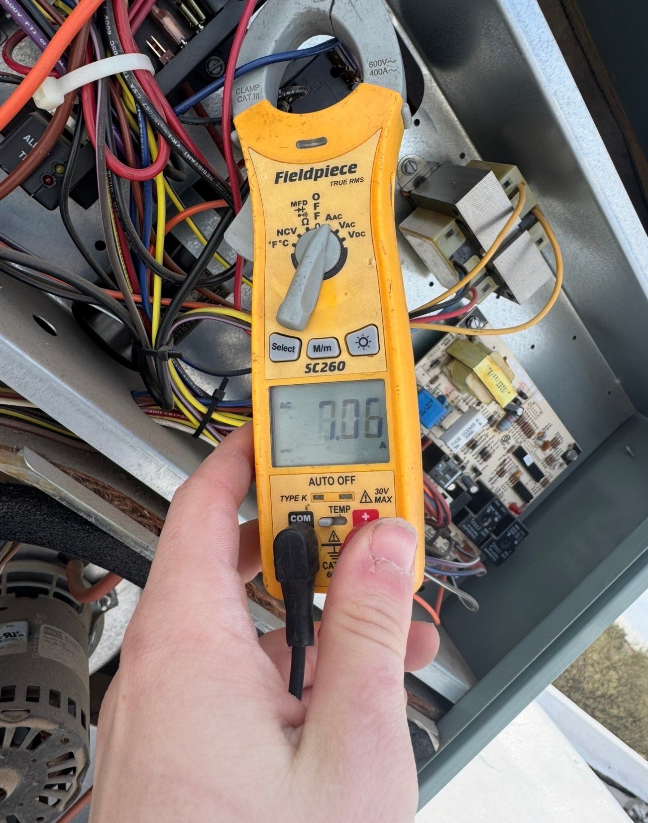 Measuring indoor fan motor amp draw during AC service in Avra Valley, AZ
