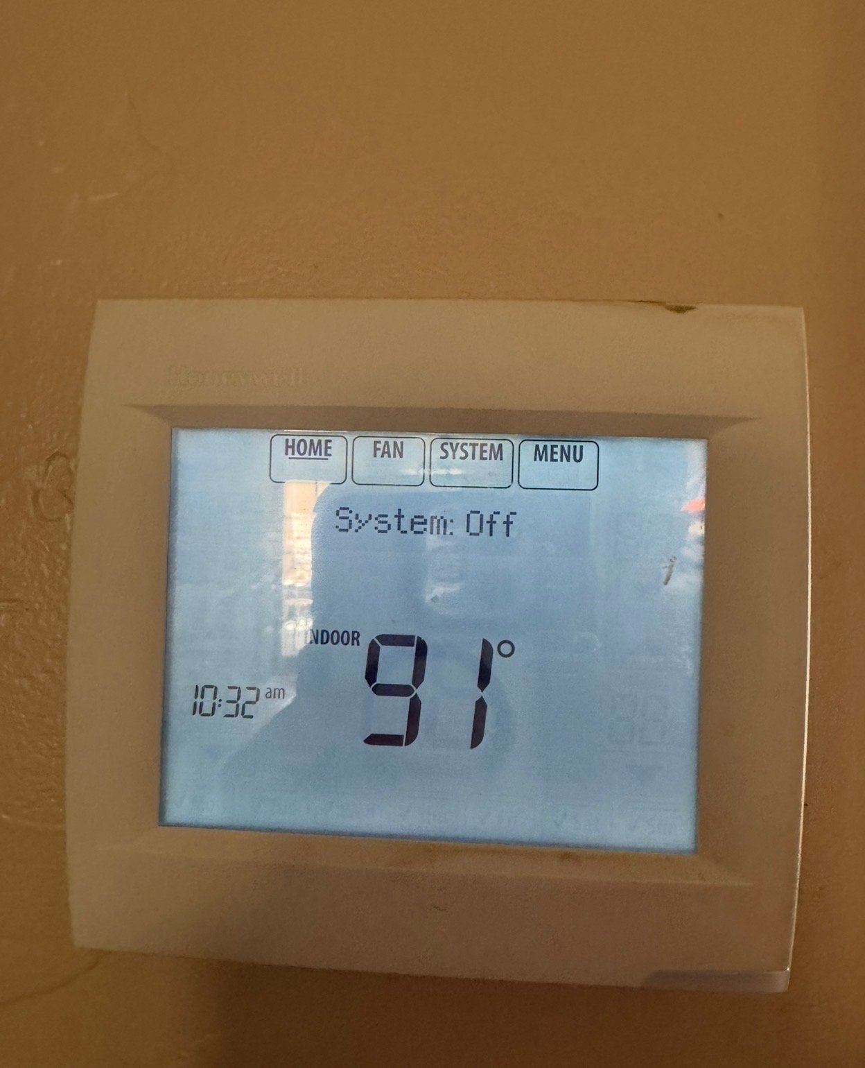 Thermostat controlling an AC system in a Casas Adobes, AZ home